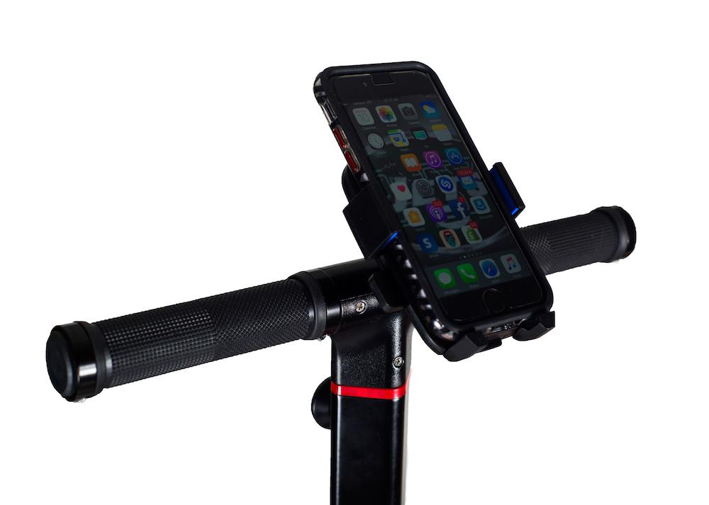Black Height Adjustable Handlebar Kit for the MiniPro and Ninebot S. Close-up of the handlebar grip and phone mount with apple iphone. More 4 Mini logo.