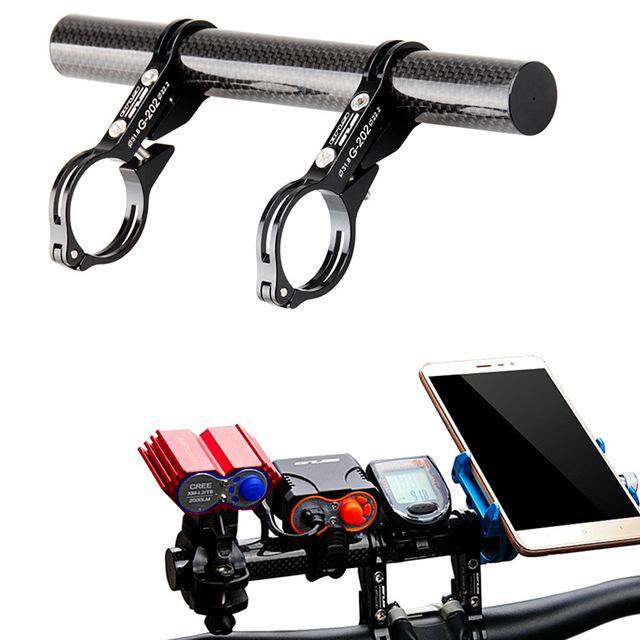 GUB handlebar extender for electric kickscooters mounted with accessories including lights, speedometer, and phone.