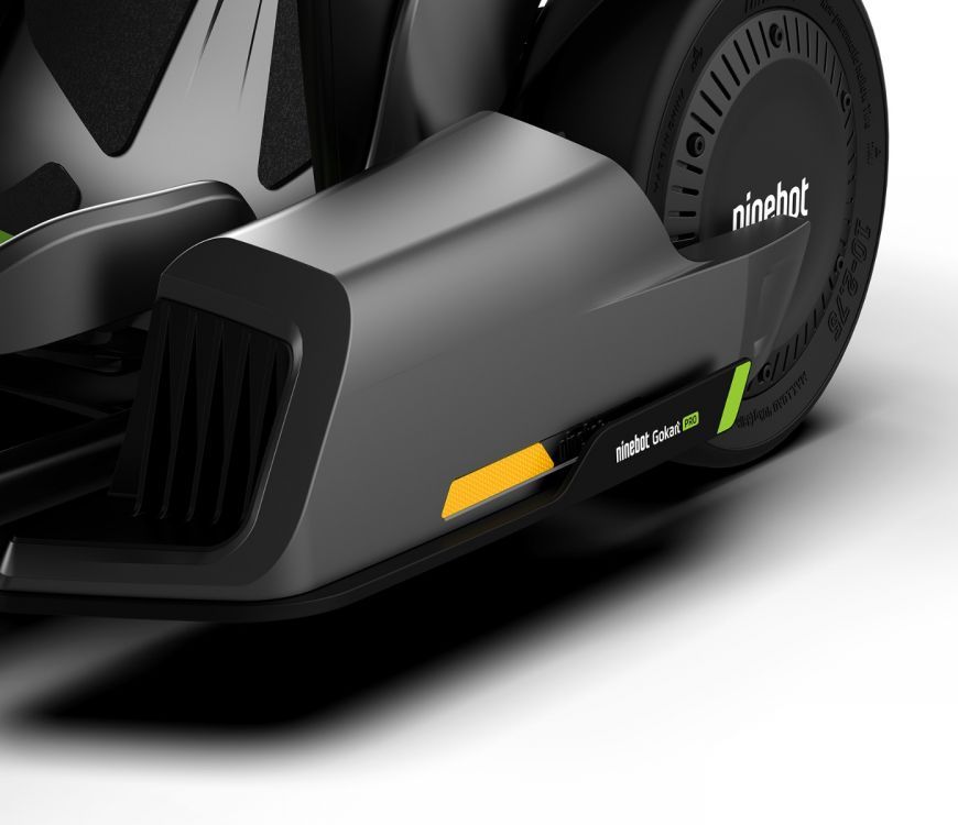 Segway Ninebot electric Gokart Pro Drift Kit with Ninebot S Max self-balancing device.  Close-up of side bumper with Ninebot logo