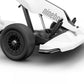 White Segway-Ninebot Gokart kit first generation with black Ninebot S self-balancing device. Close-up on front solid tire for drifting, front bumper, and gas pedal (24km/h top speed)